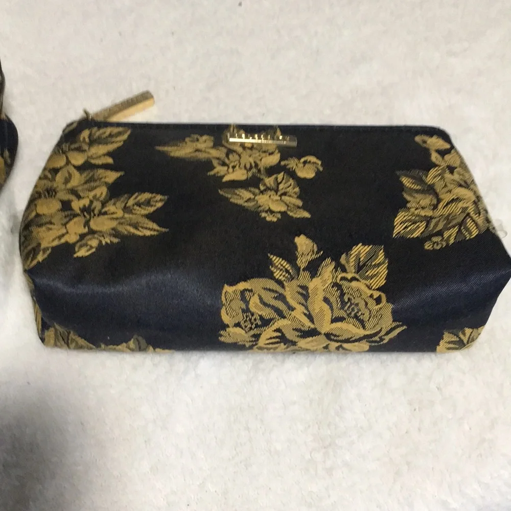 Celebrity travel bag and matching makeup bag. Navy blue with gold flowers